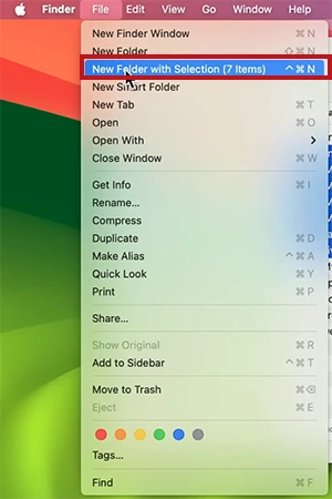 Go to the File menu and select New Folder with Selection