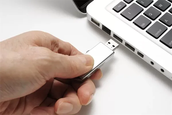 Connect the USB drive to the Mac