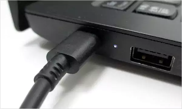 Checking the Lenovo laptop charger and power connection