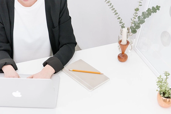 working-typing-macbook-laptop