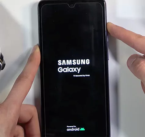 Hold the Power plus Volume Up button