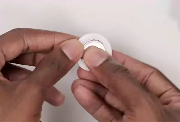 Insert the battery and press it till you hear a sound