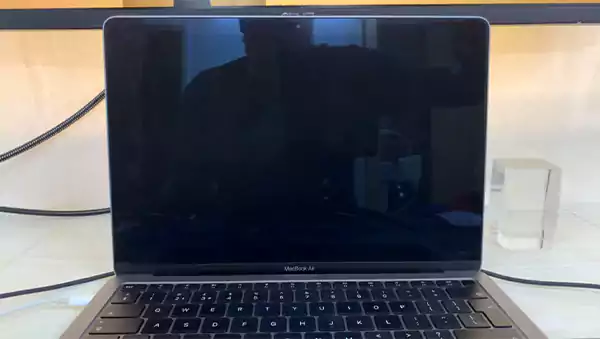 Wait for the screen to turn off and release